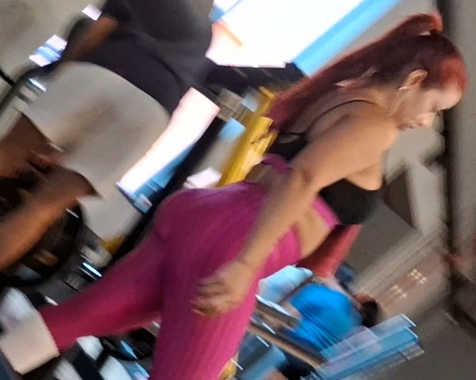 big_ass big_breasts cleavage clothed gym milf real real_person reality red_hair thick_thighs